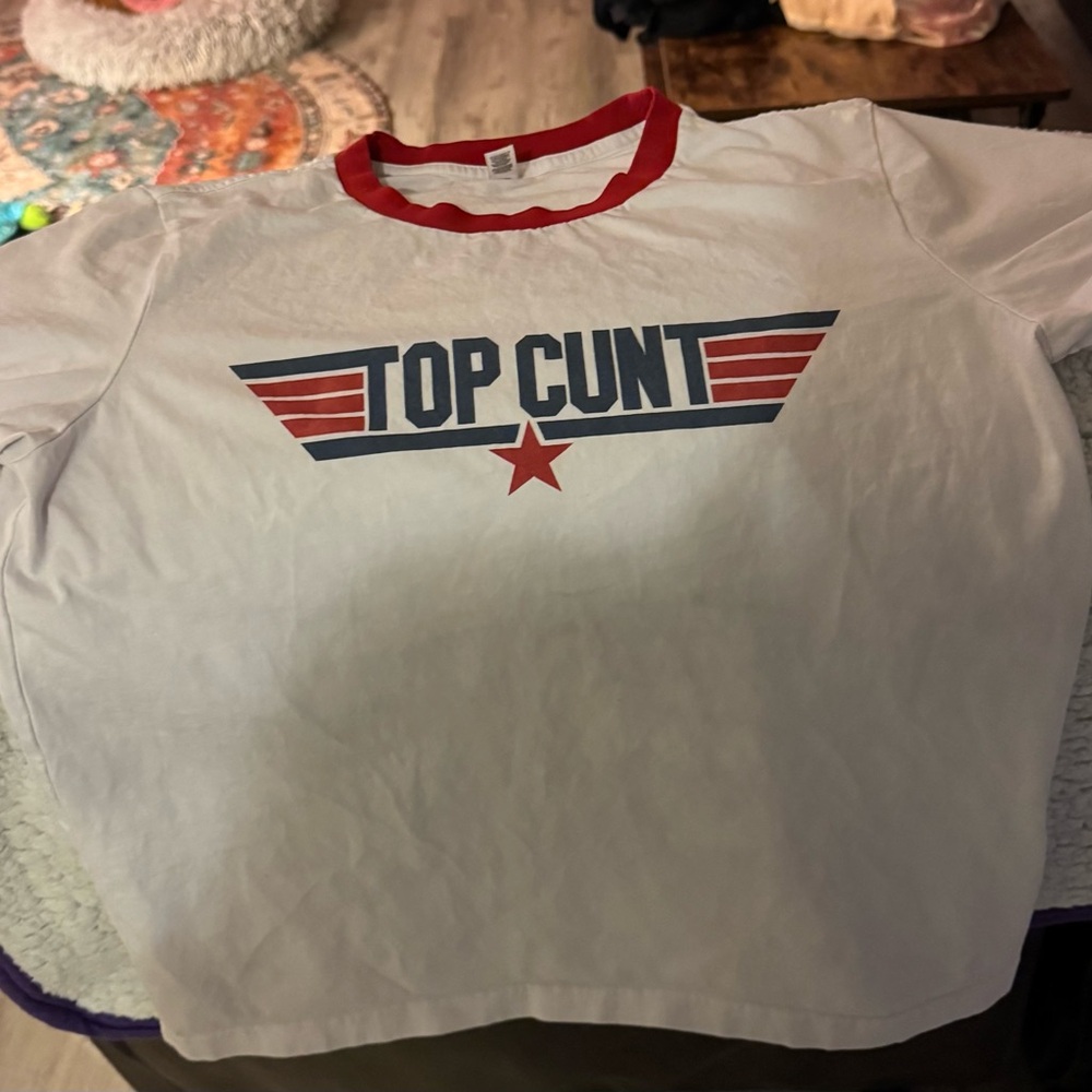 A “Top C*nt” shirt fashioned from “Top Gun”